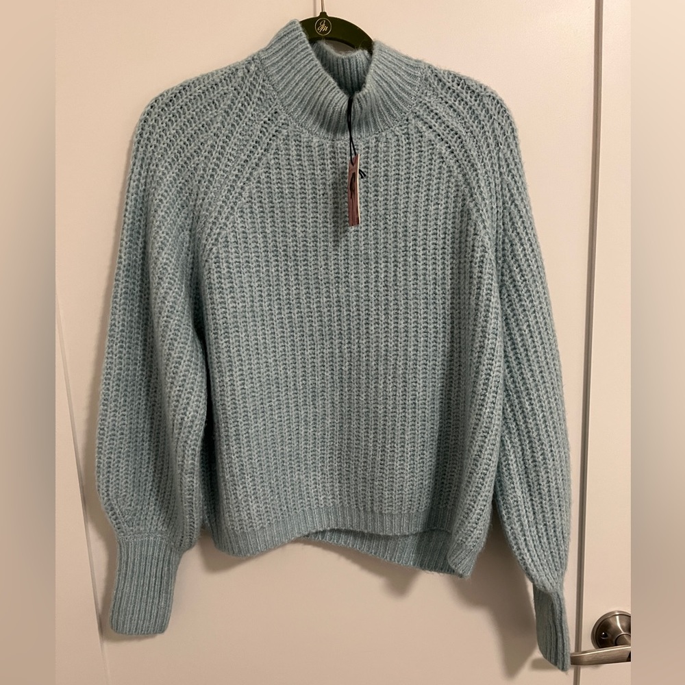 Light blue sweater